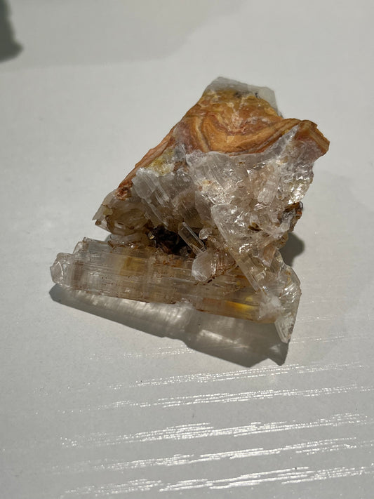 Selenite Cluster with orange/brown staining