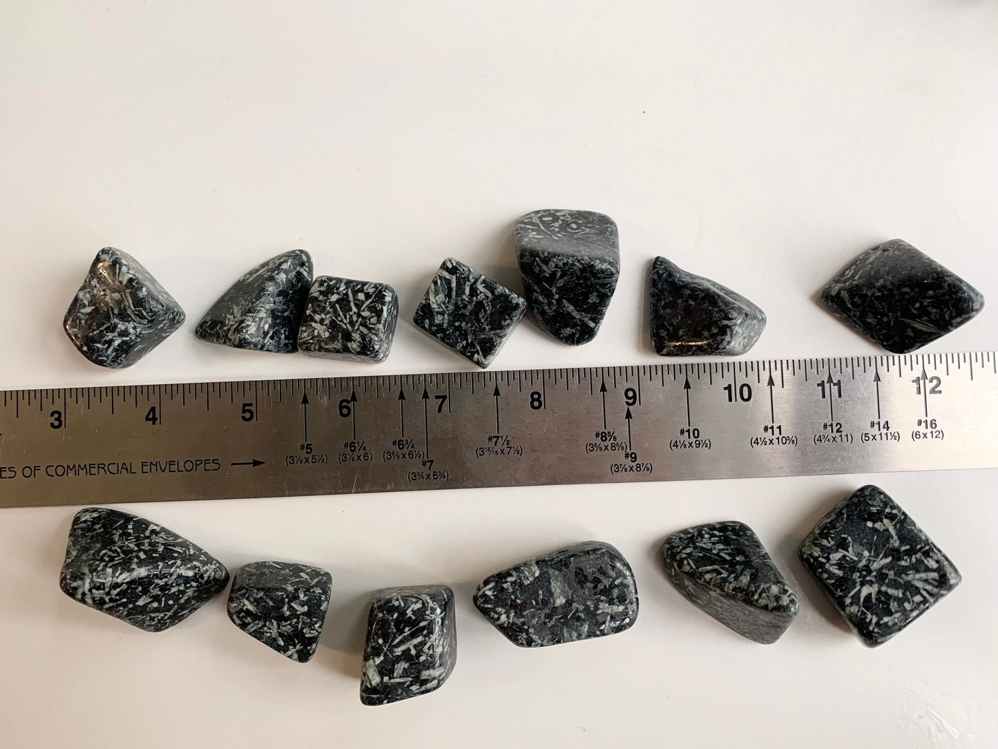 Chinese writing stone tumbles, porphyry