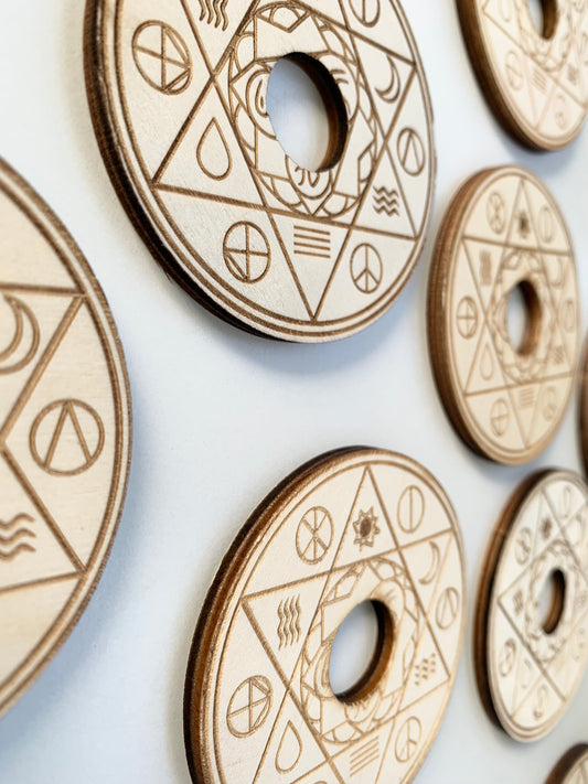 Wooden sphere holder with star, elements & phases