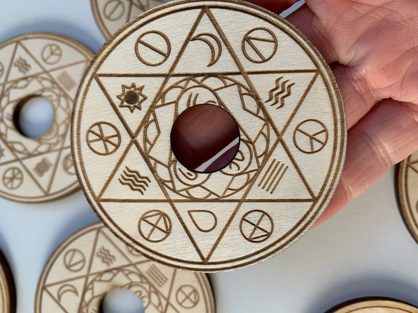 Wooden sphere holder with star, elements & phases