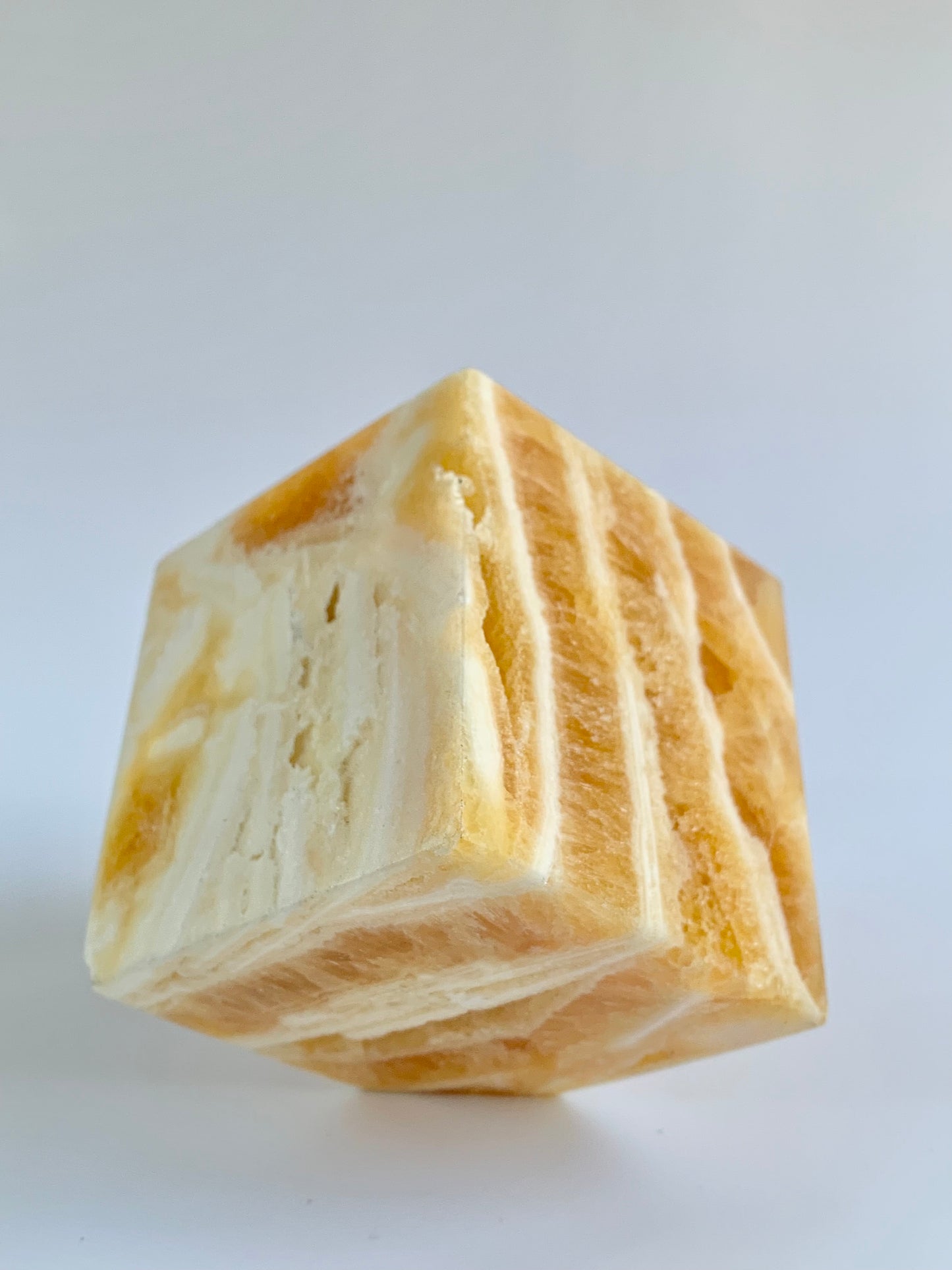 Orange Calcite Floating cube, ~19 oz