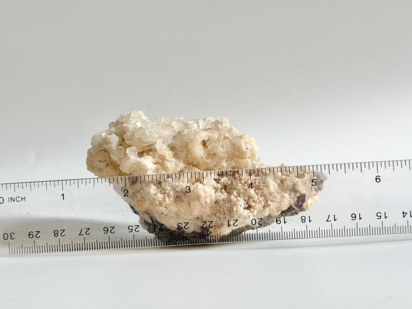 Calcite with pyrite, quartz, and galena (or tetrahedrite)