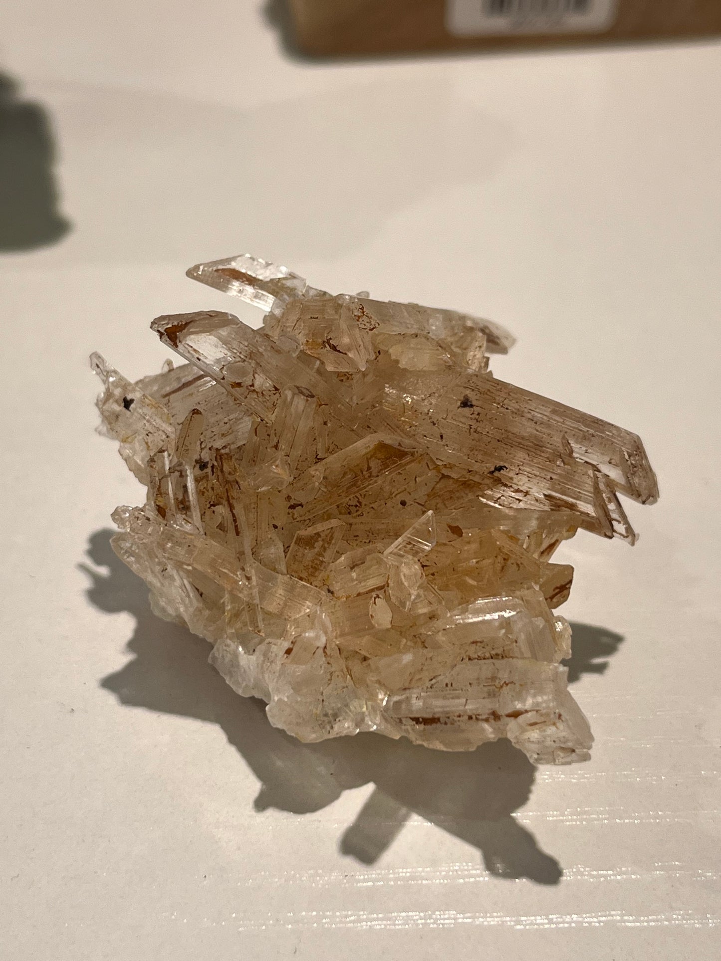 Selenite Cluster with orange/brown staining