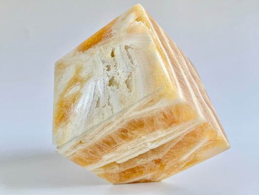 Orange Calcite Floating cube, ~19 oz