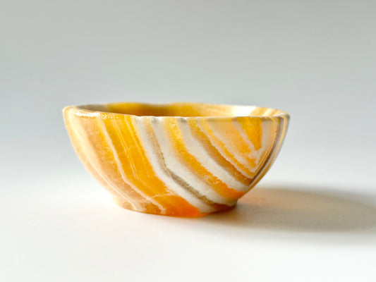 Orange calcite bowl
