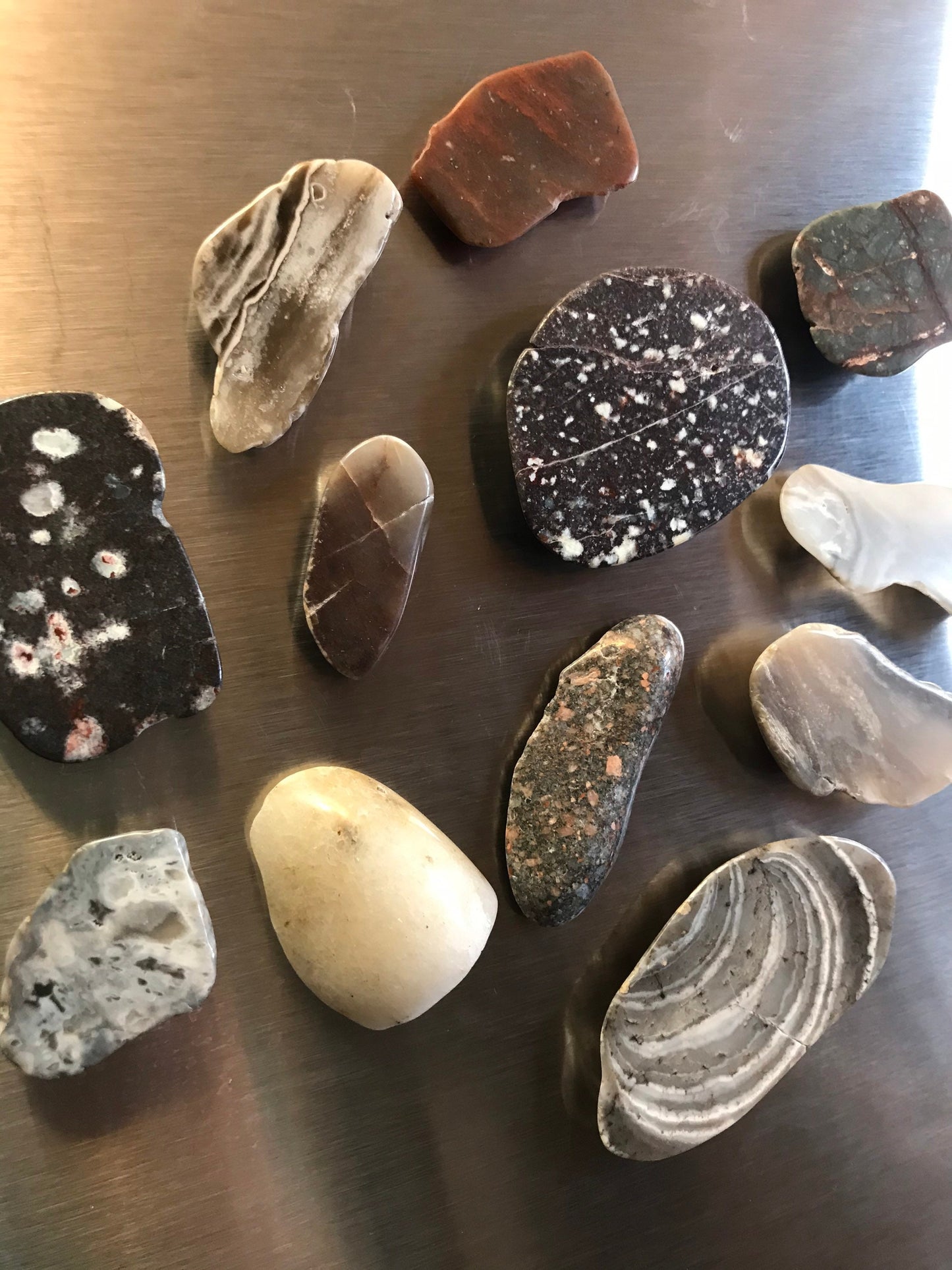 Assorted Lake Michigan stone magnets, refrigerator magnets