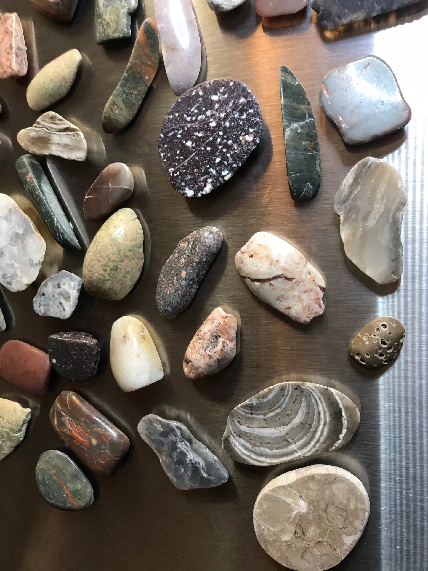 Assorted Lake Michigan stone magnets, refrigerator magnets