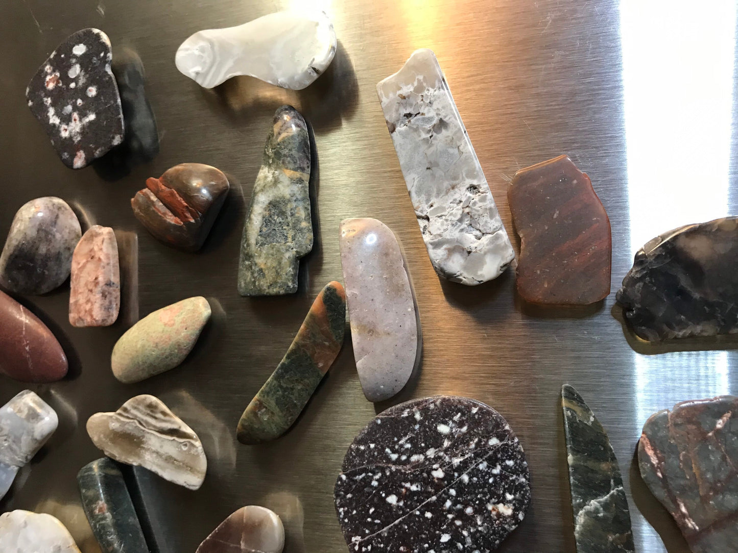 Assorted Lake Michigan stone magnets, refrigerator magnets