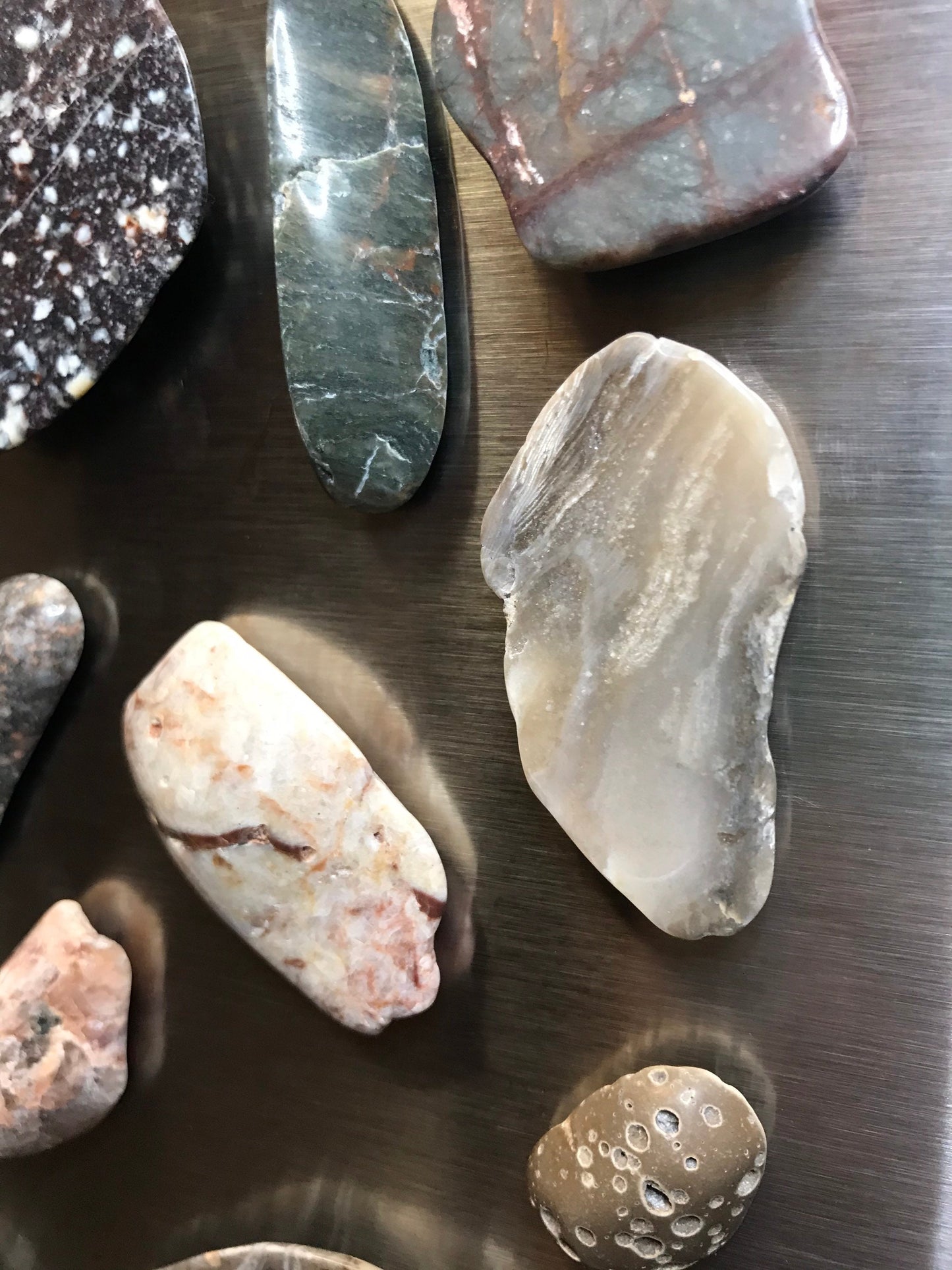 Assorted Lake Michigan stone magnets, refrigerator magnets