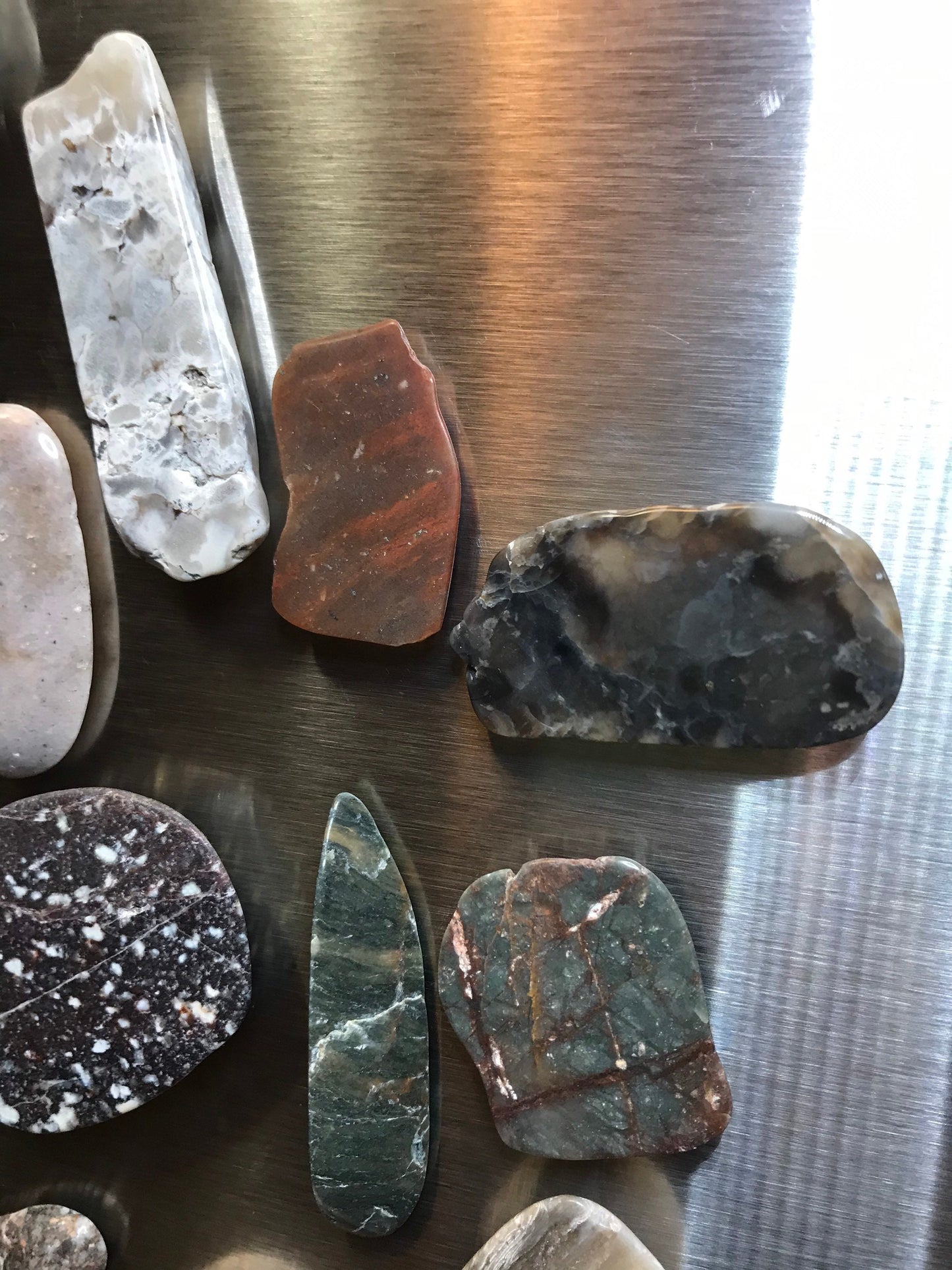 Assorted Lake Michigan stone magnets, refrigerator magnets