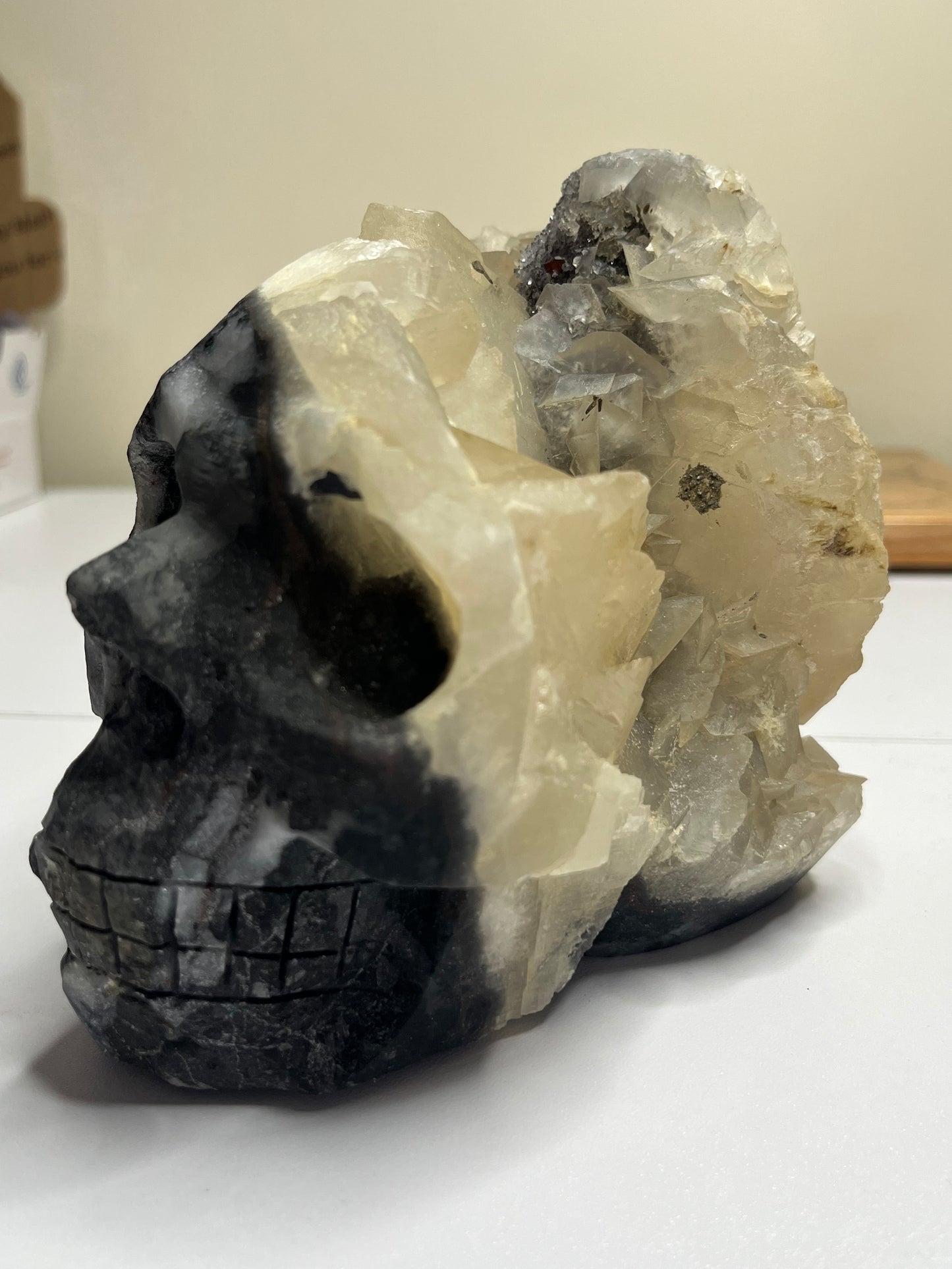 Extra large calcite blade cluster skull with garnet