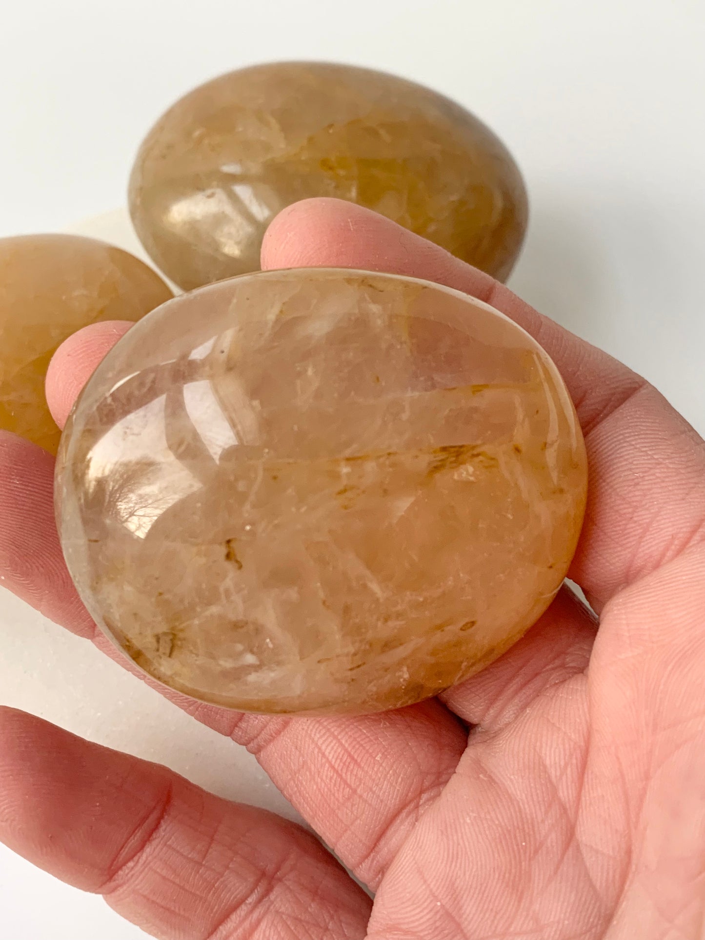 Golden Healer Quartz Palm stone, medium