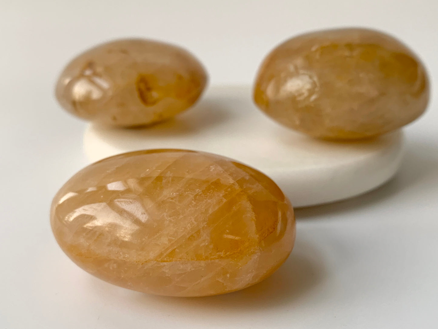Golden Healer Quartz Palm stone, medium