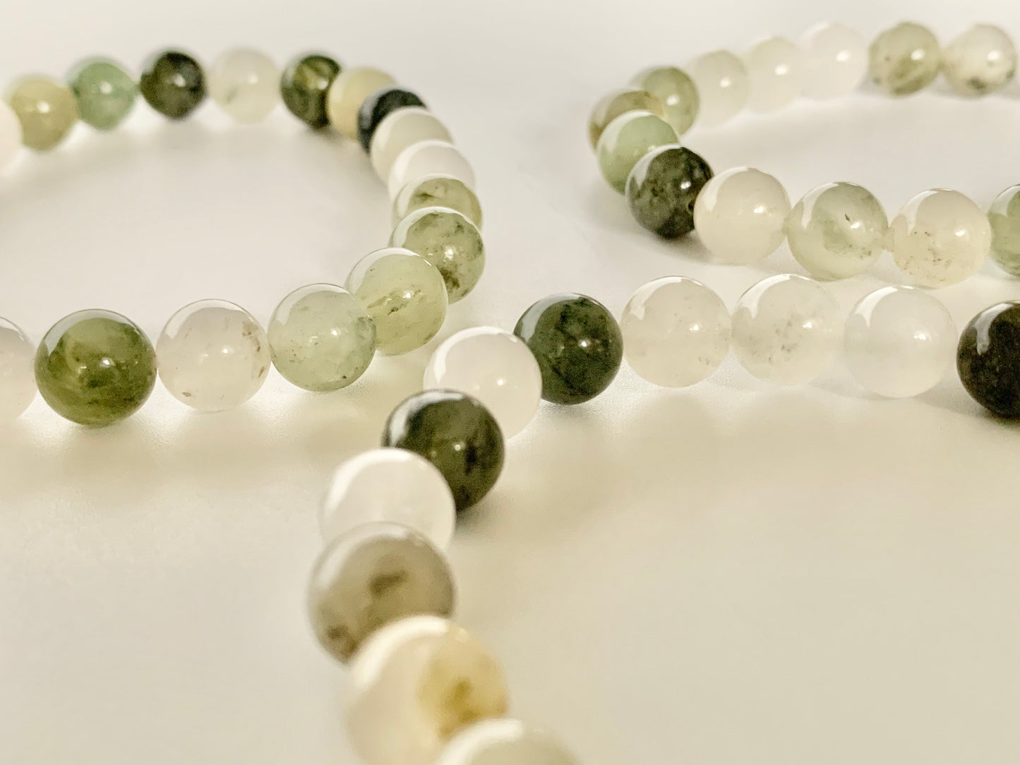 Green and white round bead bracelet