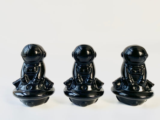 Astronaut on Spaceship Carving, obsidian